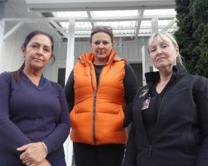 On the line ... A Woman’s Touch managers (from left) Esther Gantus and Nerissa Wild along with...