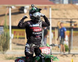 Champion at last ... Dunedin's Courtney Duncan celebrates sewing up last year’s Women's Motocross...