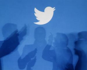 The initial public offering of Twitter closed early after investor demand. Photo by Reuters.