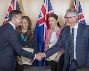 Greens co-leaders James Shaw and Marama Davidson and Labour leader Jacinda Ardern and deputy...