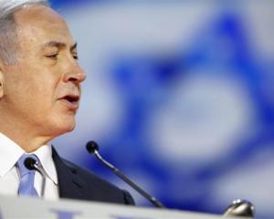 Israel's Prime Minister Benjamin Netanyahu  addresses the American Israel Public Affairs...