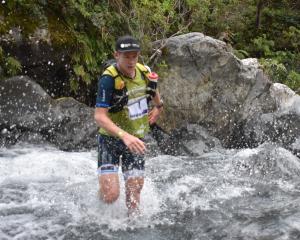 Dougal Allan tries to make his way through a waterway at last year’s Coast to Coast event. PHOTO:...