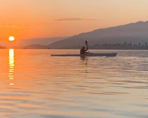 Twizel’s Craig Lay enjoys the backdrop of a spectacular sunrise during a recent kayak training...