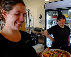 Head chef and cafe manager Louise Evans holds vegan salads at Horopito Cafe, Orokonui...