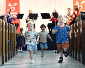 Big fans of Beethoven and running around churches (from left) Jimmy Burke (3), Oscar Muir (3) and...
