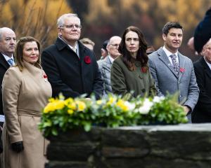 Attending a wreath-laying ceremony at the Arrowtown War Memorial yesterday are (from left) Jenny...