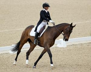 New Zealand eventer Jonelle Price and Grovine De Reve compete in the Kentucky three-day event in...