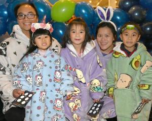 Enjoying Pyjamarama activities at the Otago Museum last night are (from left) Gabriel Pan, Mila...