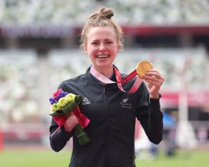 Anna Grimaldi celebrates receiving her gold medal at the Tokyo Paralympics this afternoon. Photo:...