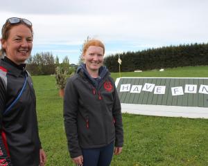 Central Southland Pony Club president Penny Frew (left) walks through the cross-country course...