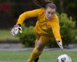 Southern United goal keeper Amy Simmers makes a save against Central during the last meeting...
