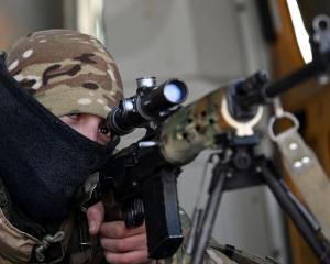 A Russian armed forces sniper takes part in military exercises in the Rostov region. Photo: Reuters