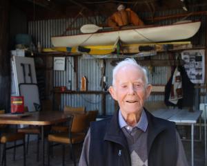 Gore man Fred Cooper, who marked his 100th birthday in Te Anau yesterday, sits at the entranceway...