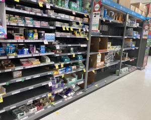 The shelves at Countdown Dunedin Central were running low on throat lozenges, painkillers and...