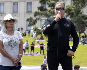 Brian Tamaki and his wife Hannah speak at the Auckland Domain protest on November 20, 2021. Photo...