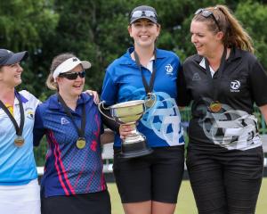 New Zealand bowlers (from left) Selina Goddard, Clare Hendra, women’s singles champion Tayla...