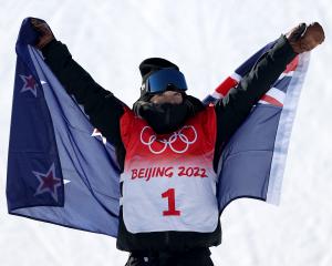 Zoi Sadowski-Synnott celebrates after her gold medal winning run. Photo: Getty Images