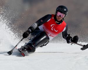 Aaron Ewen, of Wanaka, competes in the men's giant slalom sitting on day six of the Beijing 2022...