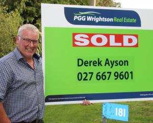Gore rural real estate agent Derek Ayson has no regrets about selling the farm and taking up a...