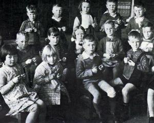 Children at Caversham School in Dunedin knit for refugees. PHOTO: AUCKLAND LIBRARIES HERITAGE...