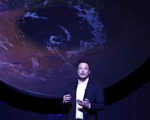 SpaceX CEO Elon Musk unveils his plans to colonize Mars during the International Astronautical...