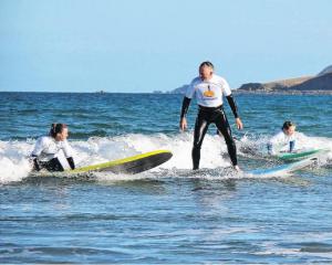 Hamish Brown stands tall as all ages get together off the land. Photo: Paul Richardson