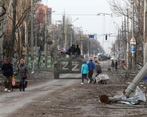 A street damaged during Ukraine-Russia conflict, in the southern port city of Mariupol. Photo:...