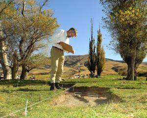 Archaeologist Peter Petchey draws excavations at Drybread, in Central Otago, after unexpectedly...