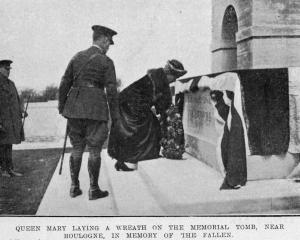 Queen Mary lays a wreath on the memorial tomb at Terlincthun cemetery near Boulogne, France, in...