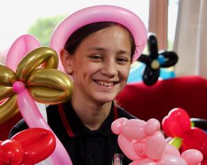 Balloon twister Greer Holland (11), of Dunedin, is developing her entrepreneurial skills one...