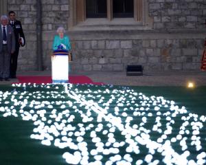 The Queen led the lighting of the principal jubilee beacon at Windsor Castle on Thursday. Photo:...