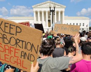 Abortion rights demonstrators protest outside the United States Supreme Court in Washington....