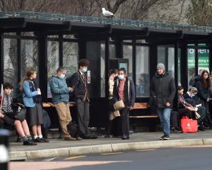 Passengers waiting at the Dunedin bus hub. PHOTO:PETER MCINTOSH