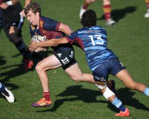Highlanders first five Cameron Millar (left) in action at the national under-20 tournament in May...