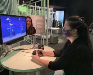 Jen Copedo takes on a game at Otago Museum.