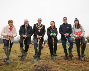 Mayor of Solihull Ken Meeson, Severn Trent staff and others plant some of the first Games forest...