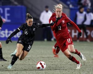 Football Ferns midfielder Emma Rolston competes for the ball with Olivie Lukasova, of the Czech...