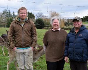 Red deer milk produced by Chris McIntyre (left) and his parents Sharon and Peter McIntyre on...