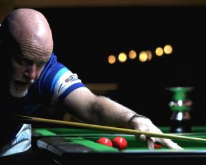 Neil Whalley, of Dunedin, lines up a shot during the final of the 8ball SuperLeague New Zealand...