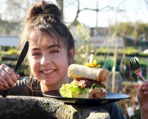 Blueskin Nurseries &amp; Cafe barista Kaysha Homan holds a knife and fork, ready to tackle the...