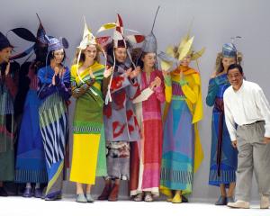 Issey Miyake at a Paris fashion show in 1997. Photo: Getty Images 

