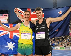 Hamish Kerr celebrates his gold with Australian Brandon Starc, who claimed silver. Photo: Getty...