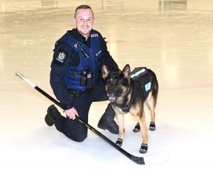 Constable Regan Wilson, a member of the Dunedin Thunder for 14 years, with police dog Vann at the...