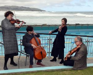 Playing to the public at the St Clair Hot Salt Water Pool yesterday are New Zealand Symphony...