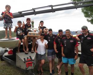 AE Baker trophy winner David Alexander (holding prize), children William (5), Jimmy (8) and Rosa,...