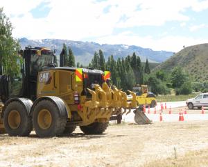 Contractors work on a turning bay for the Lowburn lakeside area. PHOTO: TRACIE BARRETT