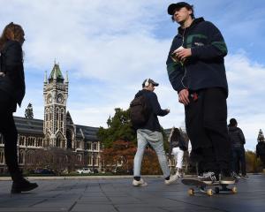 New traffic and parking regulations require  e-scooter and skateboard users and cyclists to walk...