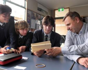 King’s High School pupils (from left) Gabe Asuncion, Josh Caldwell and Zach Schwenke (all 17)...