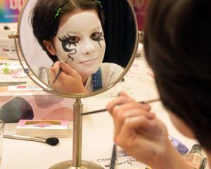 Dina Tukhvatulina (12), of Dunedin, experiments with make-up at the Dunedin Pride’s first Make-Up...