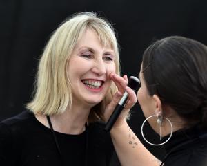 First-time model Jennifer McKean gets her makeup applied by makeup artist Ciara Fitzsimons at the...